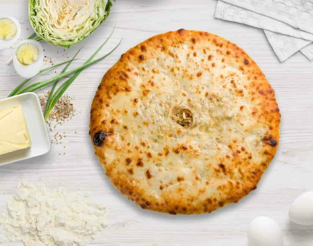 Вариант 1: Классический рецепт осетинского пирога с сыром и зеленью